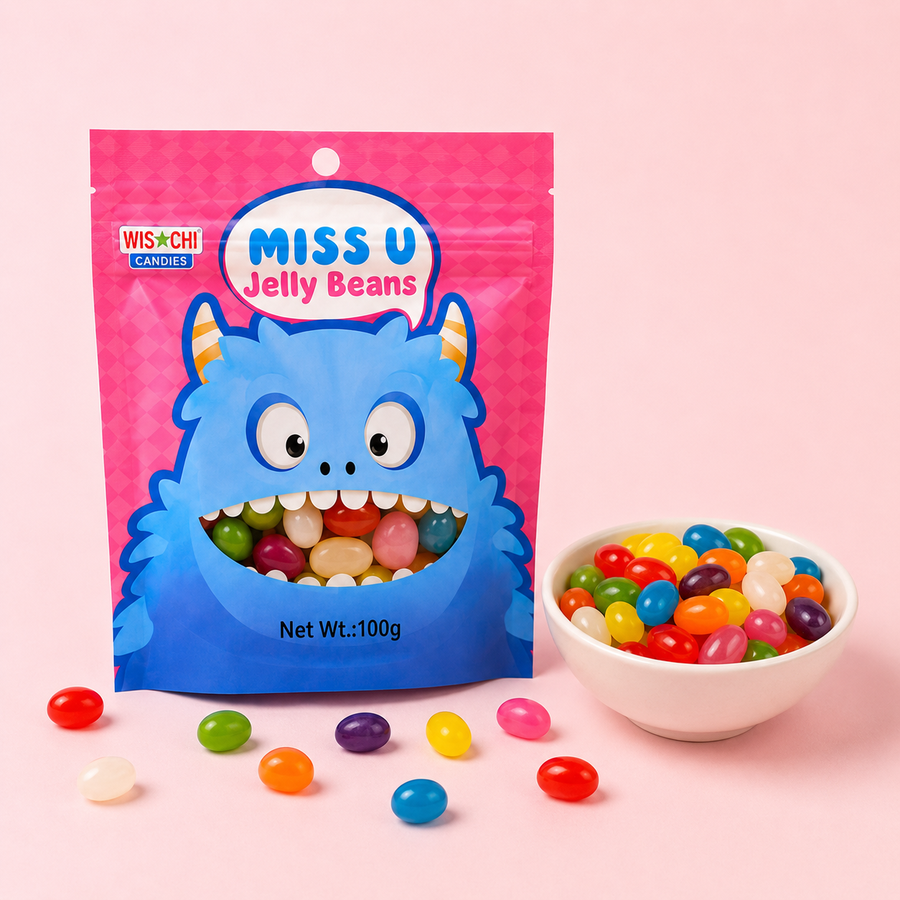 A bag of Wischi Candies Miss U Jelly Beans next to a white bowl filled with colorful jelly beans, with some scattered on a light pink background.