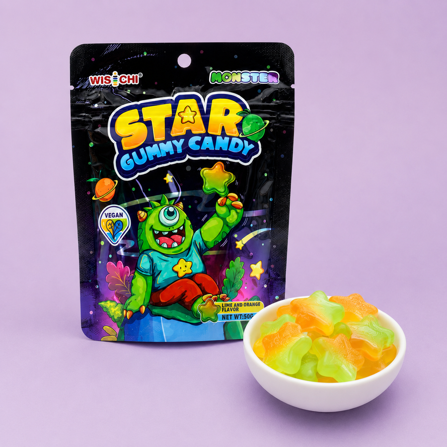 A package of Wischi Monster Star Gummy Candy stands next to a small white bowl filled with colorful gummy bears on a light purple background.
