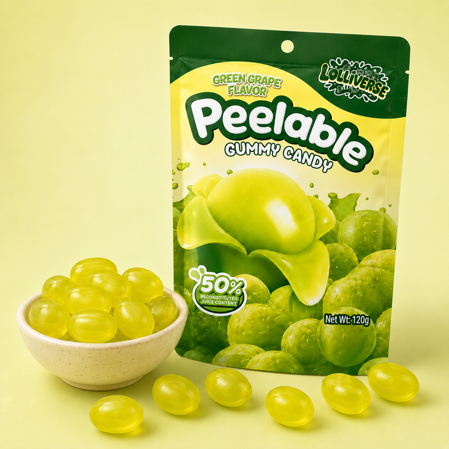 A stand-up pouch of Peelable Gummy Candy in green grape flavor, shown with a small bowl and several translucent yellow-green gummy candies on a pale yellow background. The package features green and yellow graphics with the Peelable brand name and Lo-Uvvers logo.
